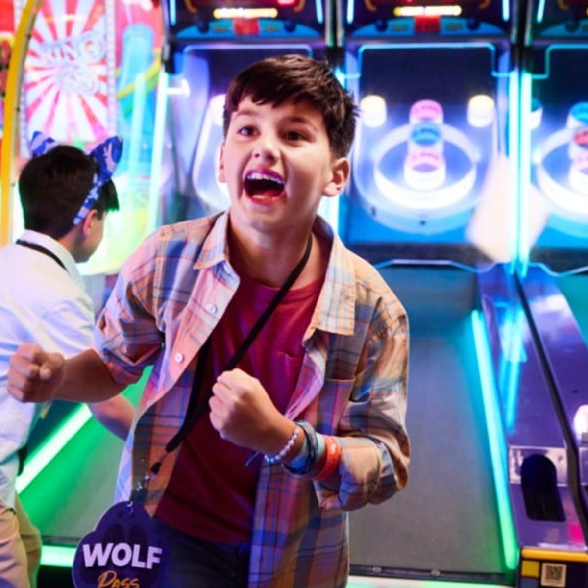 boy playing Arcade games